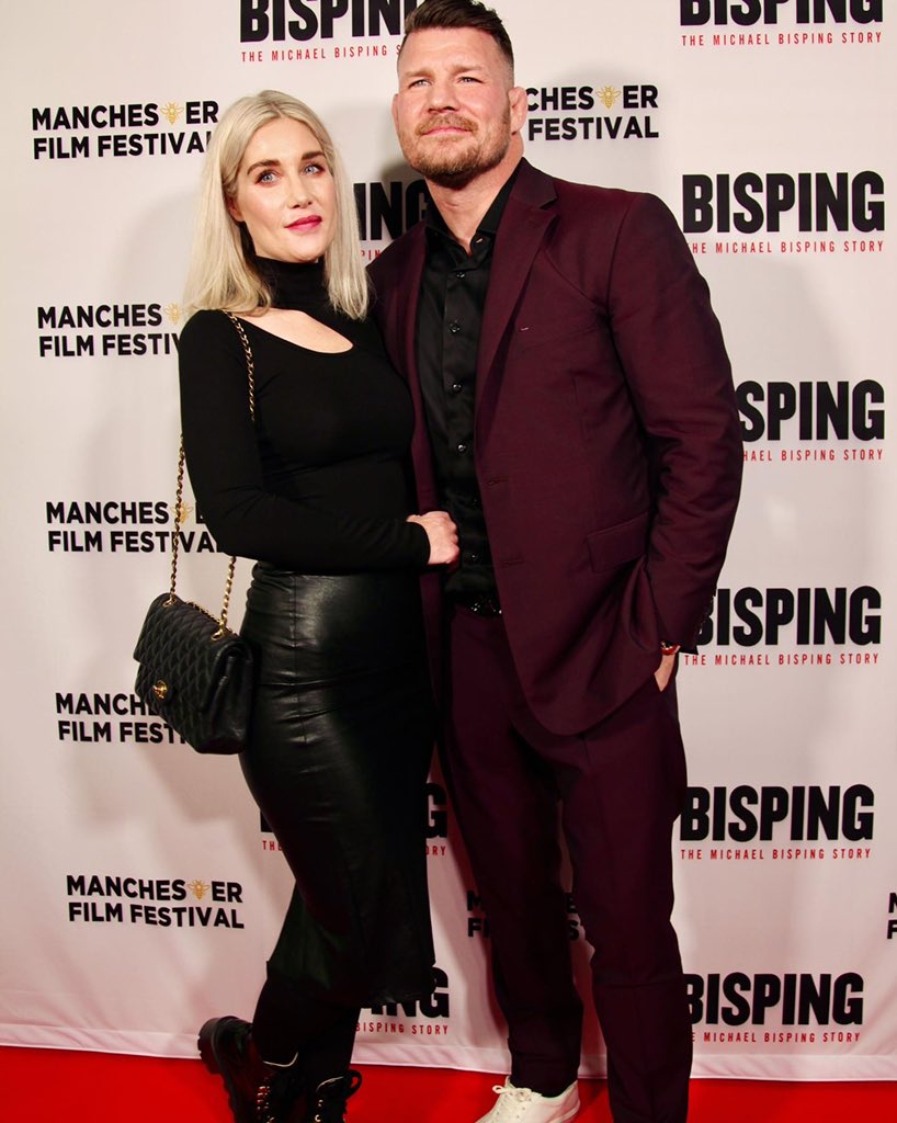 bisping's tweet photo. Me and the misses at the @bispingdoc premier on Monday. Huge thanks to everyone that came out and supported. https://t.co/YkssdyOYNY