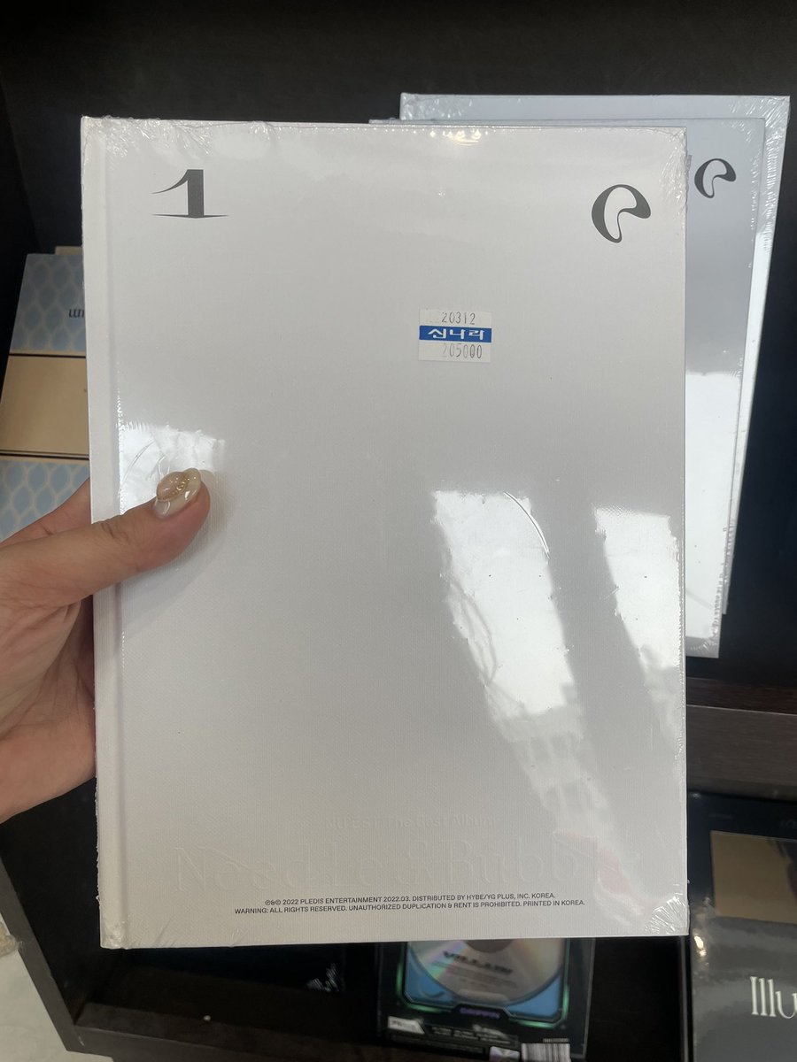 janinekwon_'s tweet photo. Couldn’t wait for my preordered albums so I decided to get one offline!! I was looking for it and I was like it’s this blank thing???? Fucking Hybe how hard is it to at least put a big NU’EST logo at the front https://t.co/TSze41MttQ