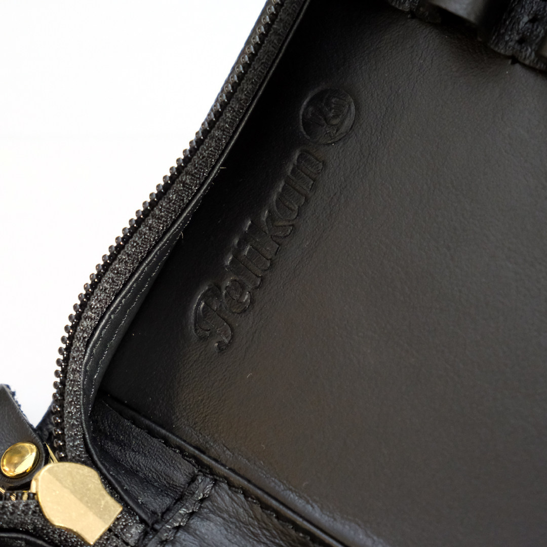 Penbox's tweet photo. A couple of the now hard to find leather Pelikan pen cases suitable for up to twenty pens now available from Penbox. https://t.co/azuwxAV532