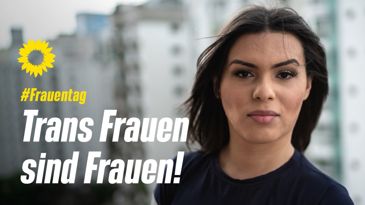 Eine Frau schaut furchtlos direkt in die Kamera. Darauf der Text: #Frauentag Trans Frauen sind Frauen!