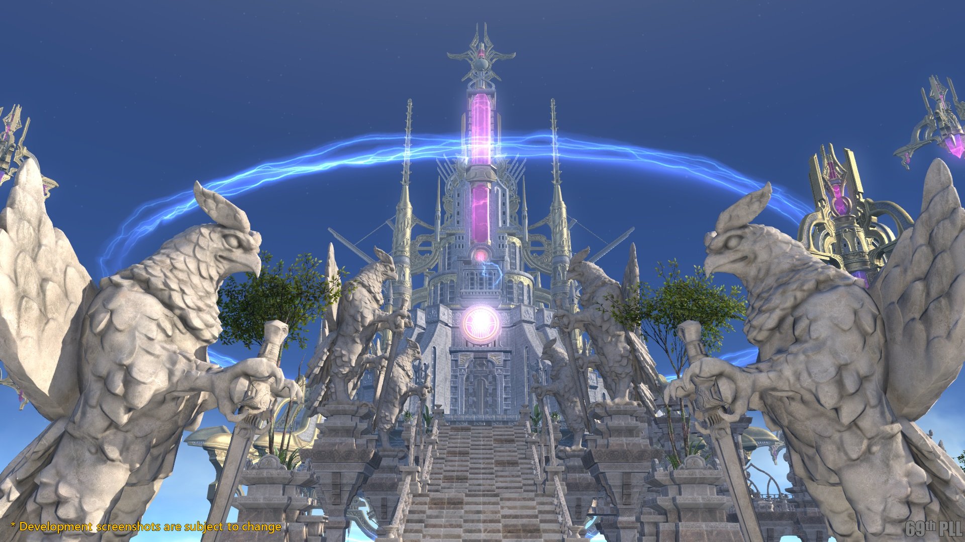 A developmental screenshot from FINAL FANTASY 14 of a grand tower surrounded by winged statues. Text at bottom reads *Development screenshots are subject to change.