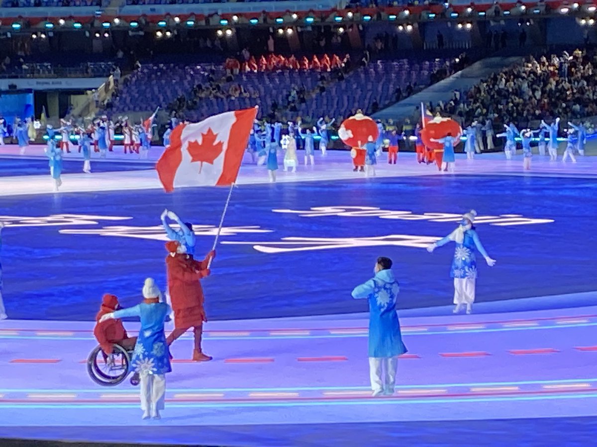 Devin_Heroux's tweet photo. CANADA 🇨🇦 HAS ARRIVED AT THE GAMES

A brilliant sea of red and white has entered the Bird’s Nest. Ina Forrest and Greg Westlake leading the way. 

It marks the first time in Canadian Paralympic history the country has been lead into the Games by two flag bearers. https://t.co/ALP8HhPqpE