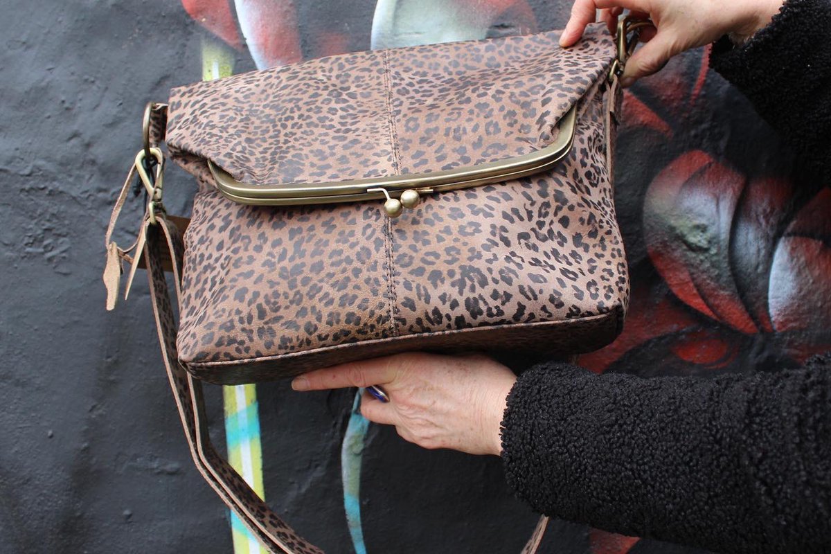 odilynchdesign's tweet photo. This is the Dublin clip bag in leopard print leather. Very spacious with a fold over style. Inside &amp; outside zip pockets  for extra security. Available in my shop in Camden or online https://t.co/g6sfAJe3eb

#CraftBizParty #OnlineCraft #handmade #shopsmallbusiness #etsyfinds https://t.co/2Dz5ZdVu2G