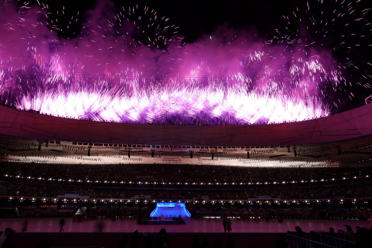 Fireworks explode around the Beijing's Bird's Nest 