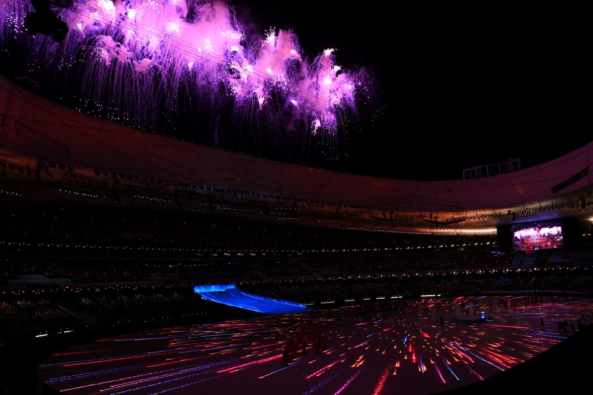 Fireworks explode around the Beijing's Bird's Nest 