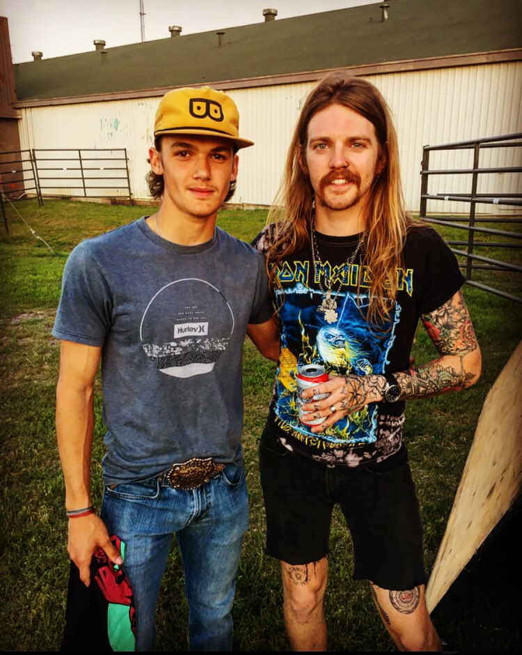 StaceyBoiles's tweet photo. @Austin_Meade I have had to take my 16 year old to several of your concerts because he’s not old enough to get in w/out me. He sings and plays guitar at our local tavern and he’s your size as you can see. #growingkid #needclothes 🤣 https://t.co/C90IbhrVHd