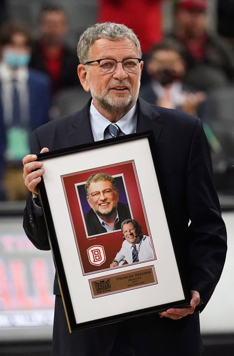 Dodgers broadcaster Charley Steiner walks off the basketball court after being inducted into the Missouri Valley Conference Hall of Fame, before the start of the Missouri Valley Conference Basketball Tournament at the Enterprise Center in St. Louis on Friday, March 4, 2022.