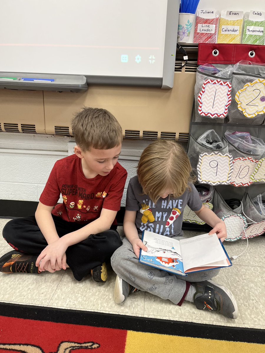 MrsMaheuKdg's tweet photo. Wearing our crazy socks and reading Dr. Seuss books with partners to wrap up Read Across America week! So proud of these readers!🥰📚🍪 #CLS #WeAreChardon @ChardonSchools #TinyToppers https://t.co/hUB1Qtq19o