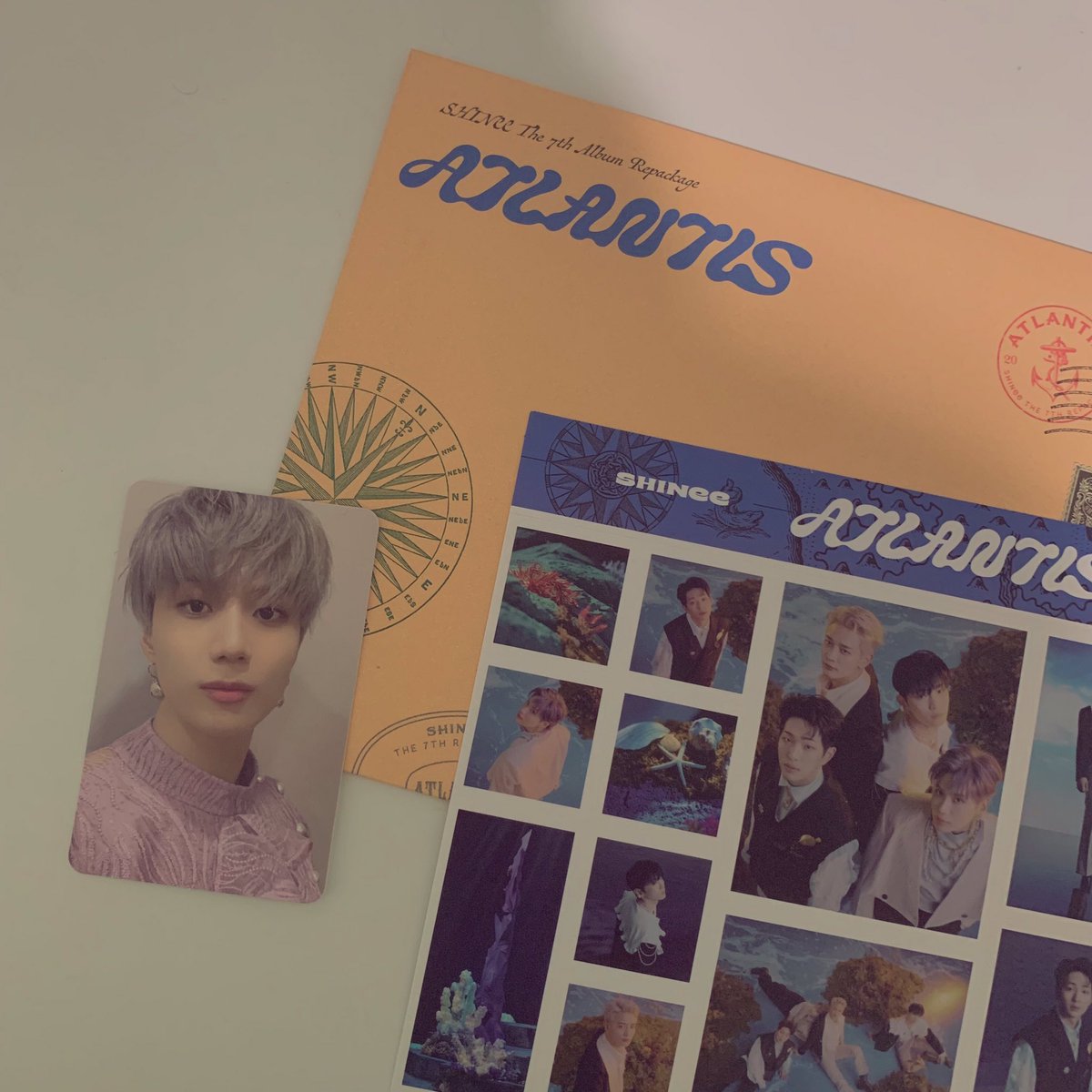 stennicakes's tweet photo. *ੈ‧₊˚ SHINee ATLANTIS ⋆.ೃ࿔*:･ 

— bought from shopee @aju_express. Thank u for bringing these home safely and for the freebie sticker &amp; key postcard !! It really surprised me when I opened the package huhu. Super happy with my purchase <33

꒰ #AjuExpressFeedback ꒱ https://t.co/ErxYb8Qyp3