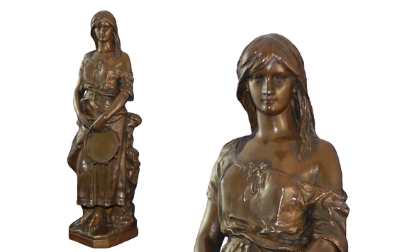 An absolutely stunning bronze sculpture by the renowned Claudius Marioton (1844-1919), depicting a young woman holding a tambourine, standing on a stone plinth.  ✨@timsaltwellantiques