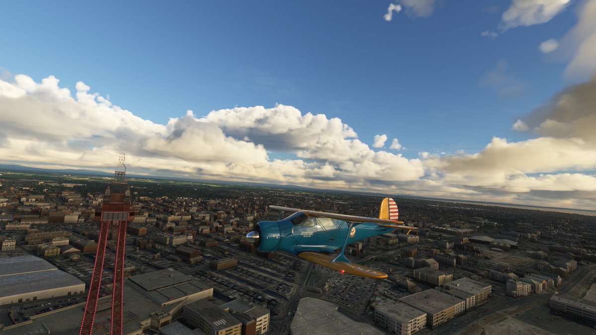 TheBadSimPilot's tweet photo. Flight sim Screenshot of the day: Blackpool tower fly by in the Staggerwing @MSFSofficial #FSSOTD https://t.co/mzdatLo5el