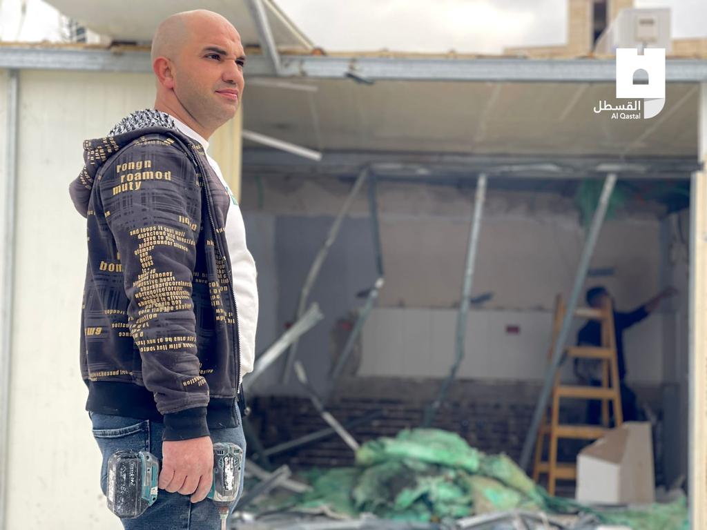 OnlinePalEng's tweet photo. Members of the Palestinian Shweiki family helplessly standing on the rubble of their home in Beit Hanina in occupied Jerusalem after they were forced to demolish it by Israeli municipality to avoid paying exorbitant costs if the municipality carries out the demolition on its own. https://t.co/pswGfQJzFA