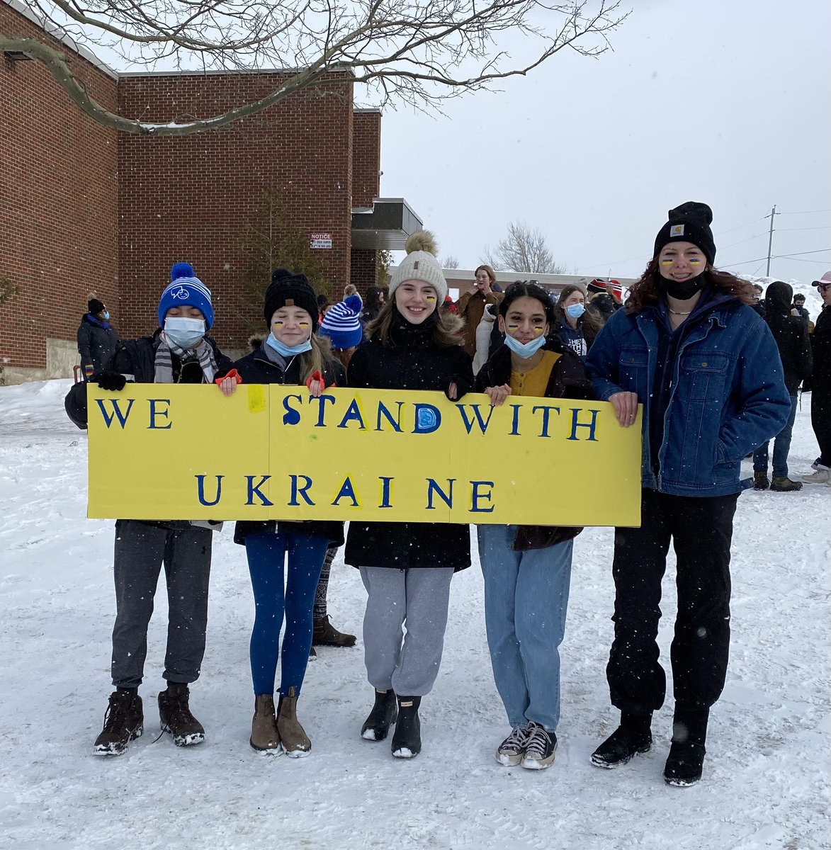XavierJRH's tweet photo. Xavier staff and students stood with Ukraine today. Showing their support by wearing blue and yellow, as well as participating in a peaceful rally in the town. Great job students!! 🇺🇦 #Ukraine @CBCNews @NLESDCA @NTVNewsNL https://t.co/bviOAFA4aY