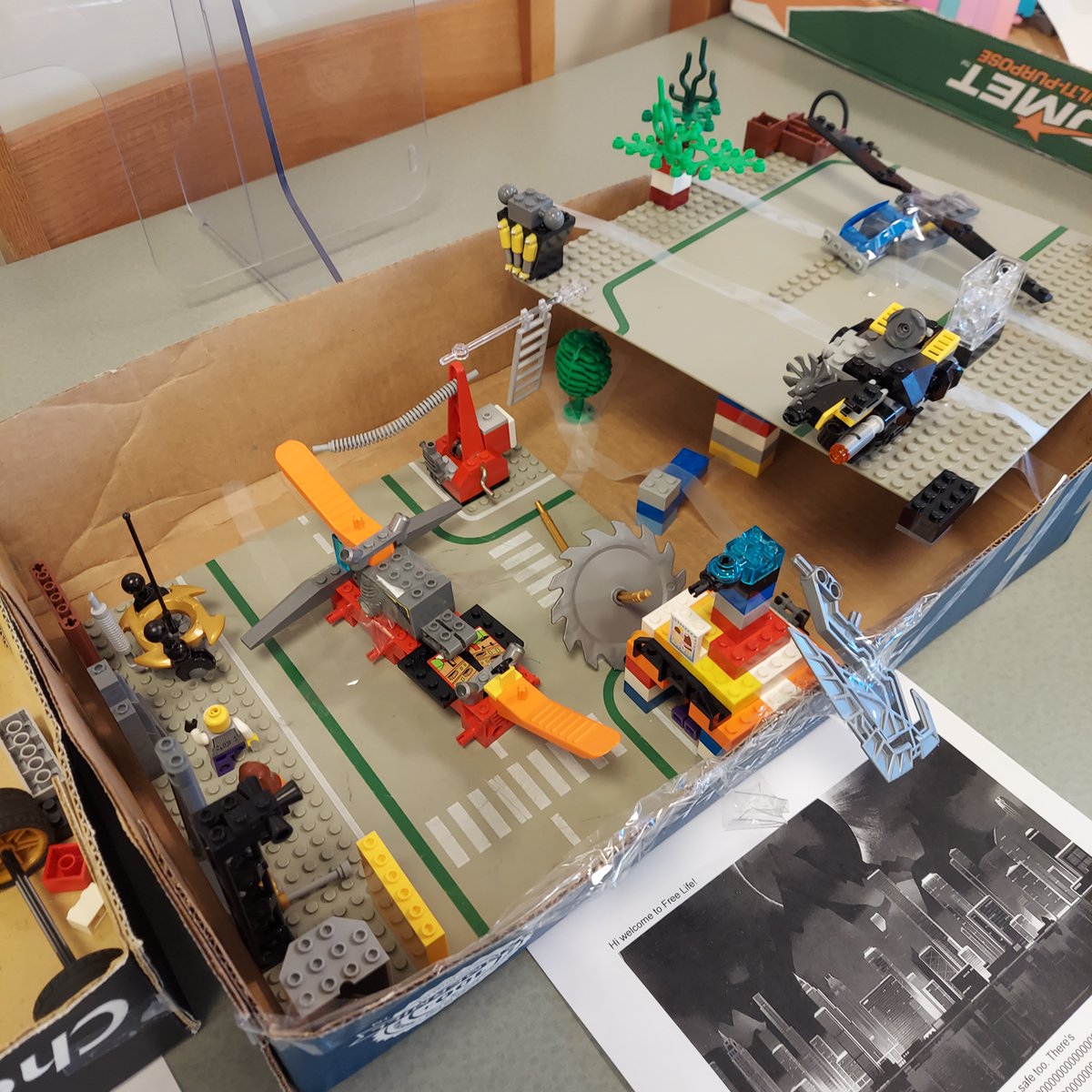 UES_Library's tweet photo. Second Grade friends may be future city planners. How would you like to have walk up health bars, free daycare centers and use dragons for transportation?  @UEStars @LEGO_Education #imagination https://t.co/l3uvpnWEta