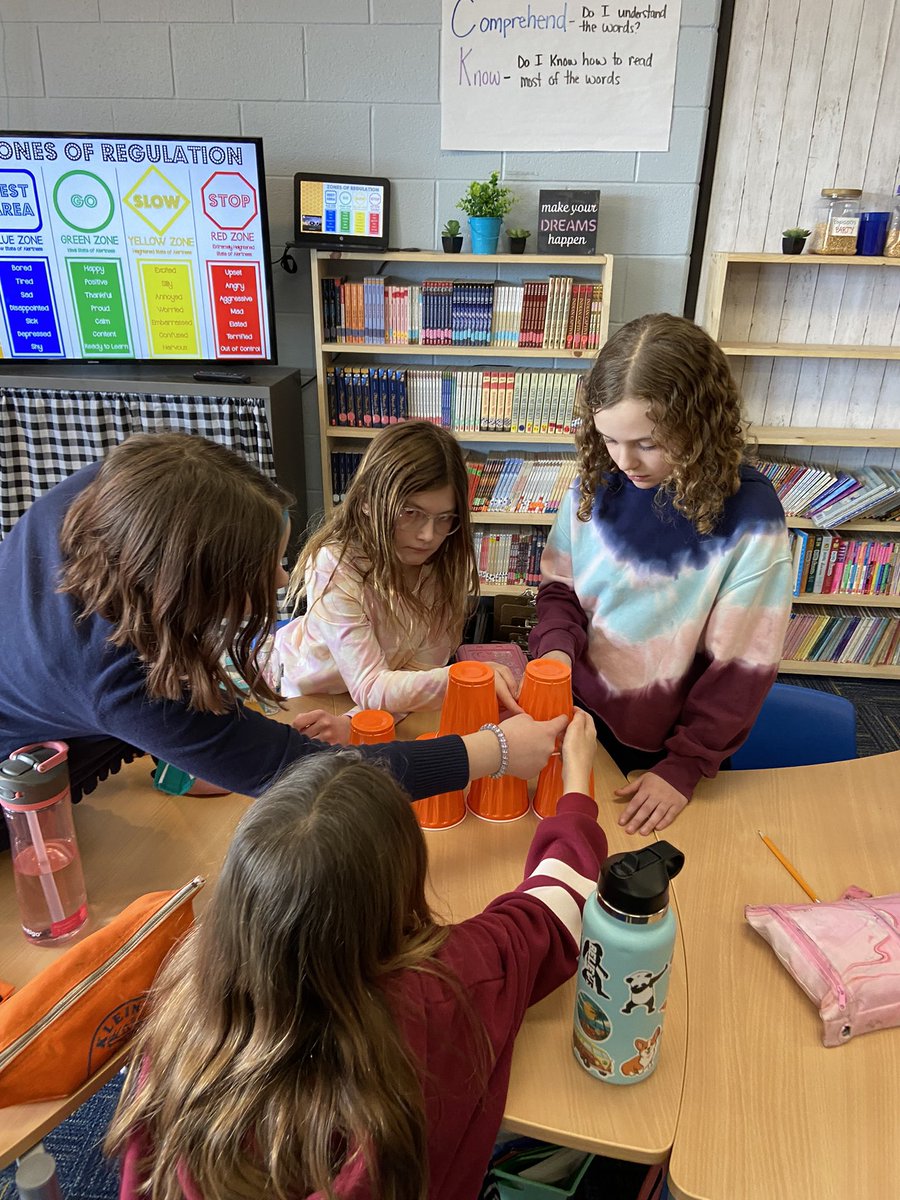 Today we practiced being persistent with a stacking cup challenge!
