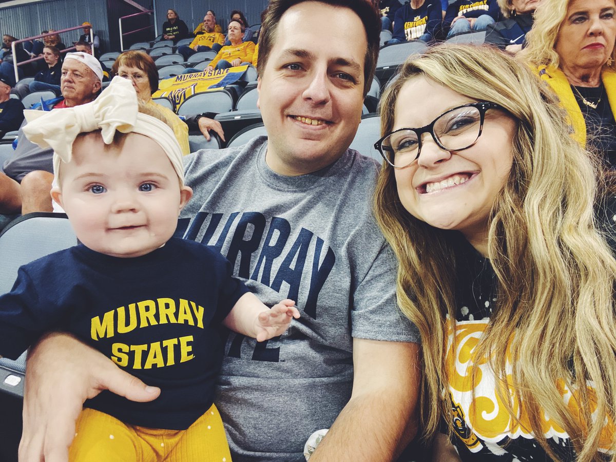 Jess_Lovett's tweet photo. Cam’s first OVC tournament! She loved cheering on uncle Wyatt and the Lady Racers 🤍💙💛 @CoachTomFoust @MSUCoachFoust https://t.co/xDwa0hWZpk
