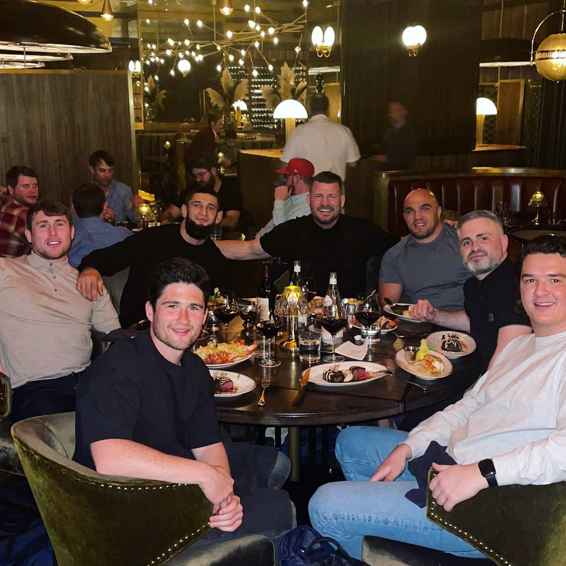 bisping's tweet photo. Dinner with the boys https://t.co/e7no9T4pi8