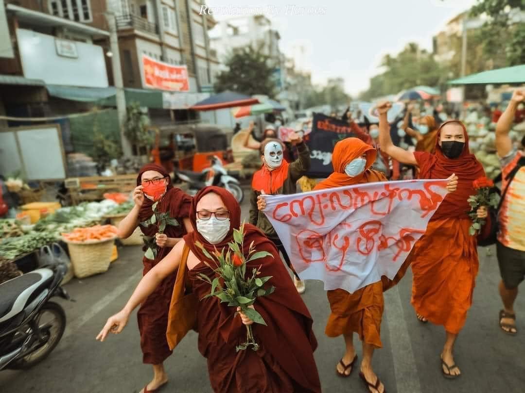 IrrawaddyNews's tweet photo. Monks, students and LGBT people gathered at a market in downtown Mandalay Saturday morning to show their opposition to the military regime. 
(Photo: RBH)
 #WhatsHappeningInMyanmar https://t.co/d3RHpG5miu