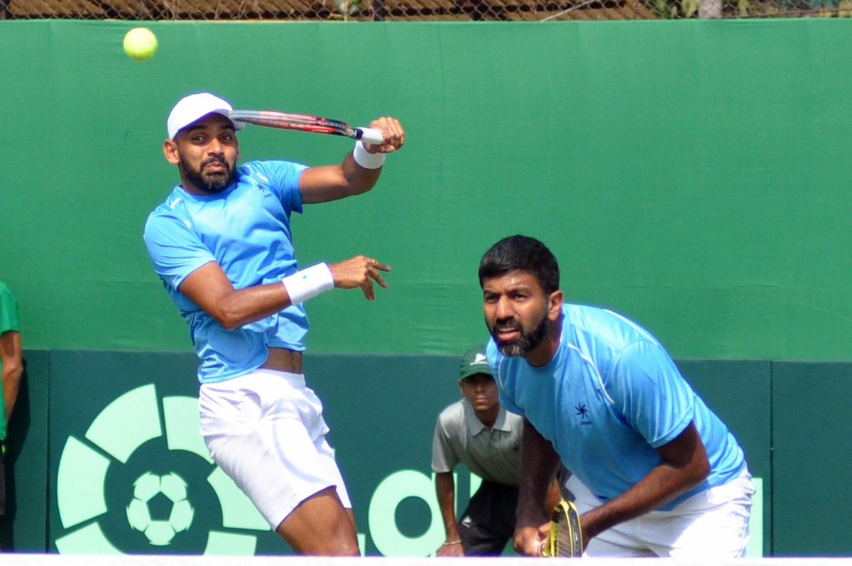 ians_india's tweet photo. Indian pair of #RohanBopanna and #DivijSharan defeated #Denmark's #FrederikNielsen and #MikaelTorpegaard 6-7 (3-7), 6-4, 7-6 (7-4) in an intense doubles match of the #DavisCup World Group 1 Playoff at the Delhi Gymkhana Club. https://t.co/HhsA5dZmYZ