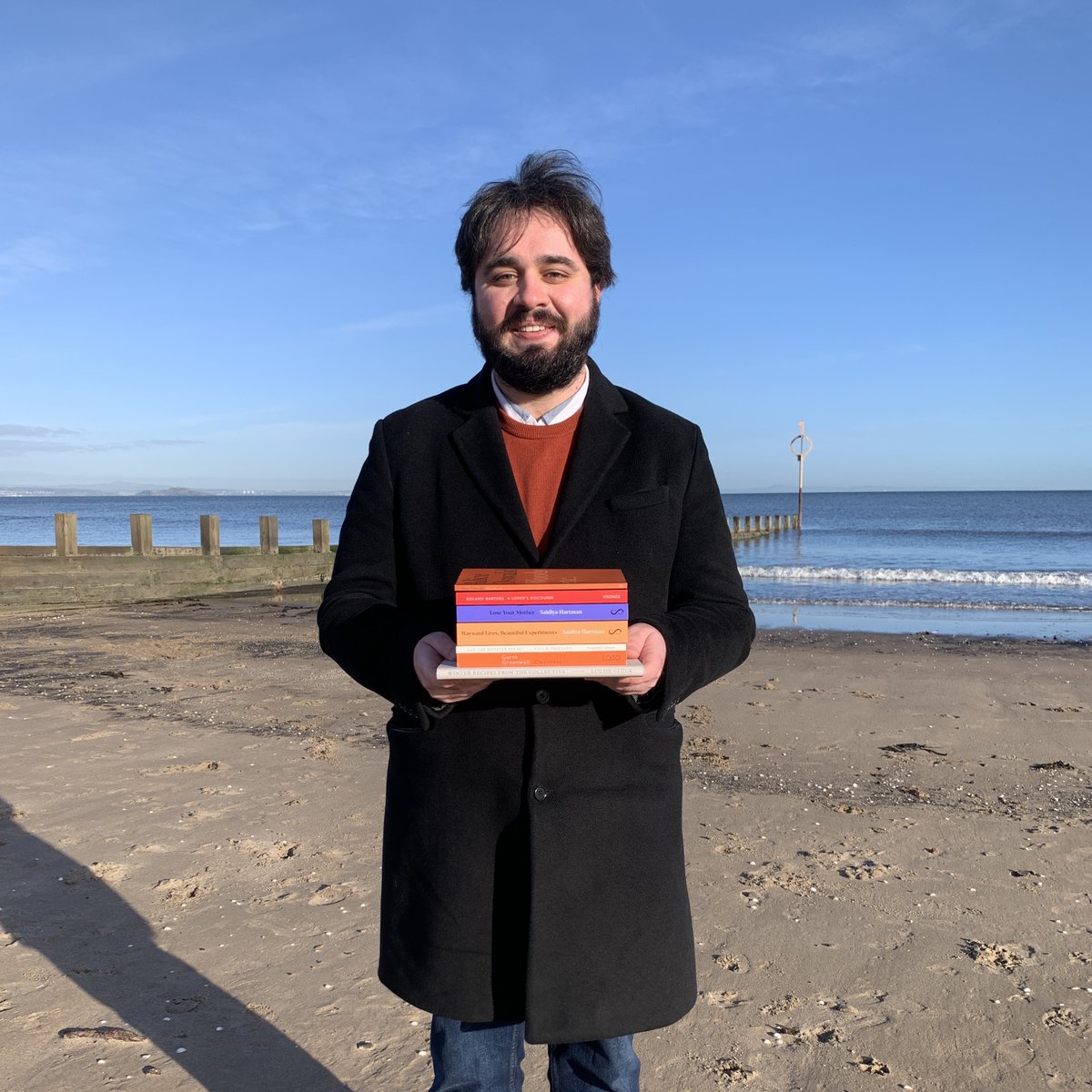 PortyBooks's tweet photo. It’s a beautiful day here in Portobello, the sun is shining and the sky is clear blue. It seems only fitting that we continue on with our Bookseller On The Beach series, featuring our bookseller Marc and his recent reads. #BOTB https://t.co/k7nFR8WjtZ