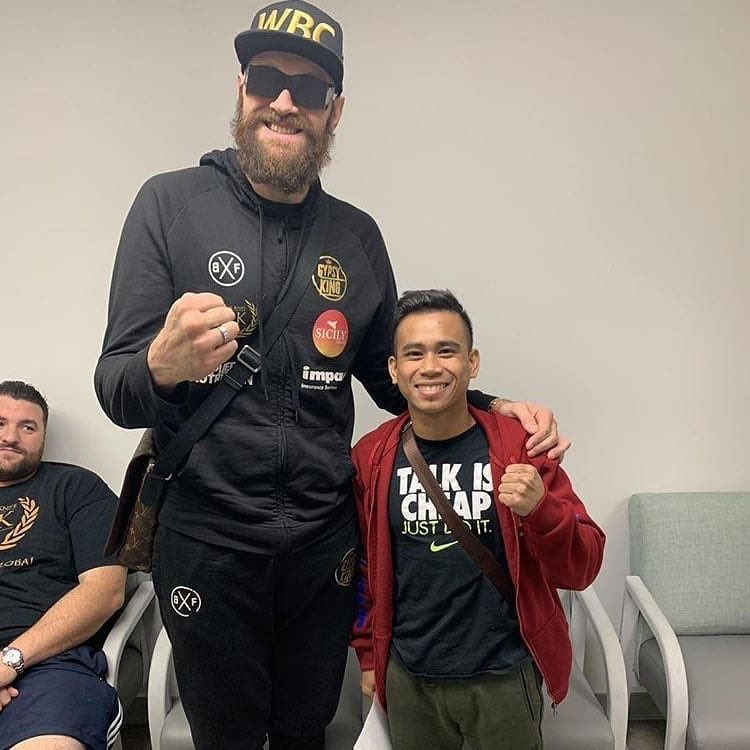 ringmagazine's tweet photo. When 6ft 9ins heavyweight Tyson Fury met 5ft 2ins minimumweight Mark Anthony Barriga… https://t.co/PnXbFWz3Bm