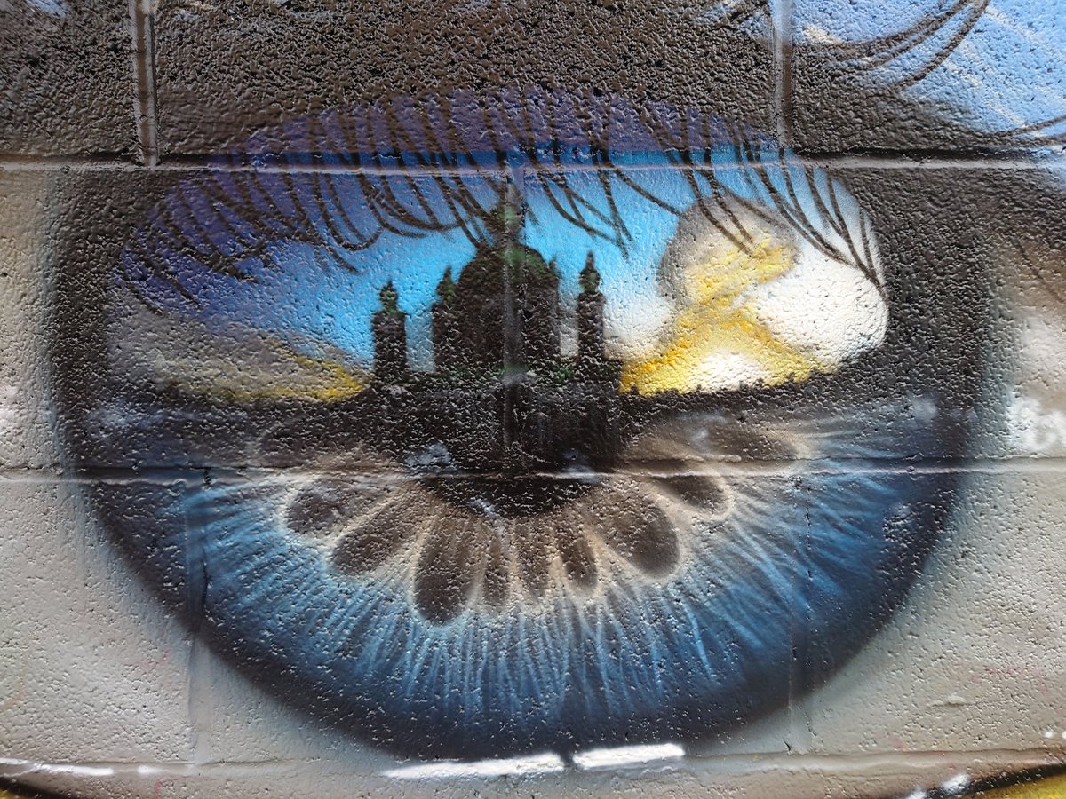 TheCosmicInk's tweet photo. "The tear speaks for itself. A horrid, horrid situation." 
~ @MyDogSighs who made this #StreetArt in #Cardiff Street ft. #Ukraine flag &amp; capital #Kyiv

Its time for our #NFTCommunity to #StandWithUkraine

#nftcollectors #NFTGiveaway #NFTs #NFTartist #NFTart #nftcollector #opensea https://t.co/IhmXvHv5fr