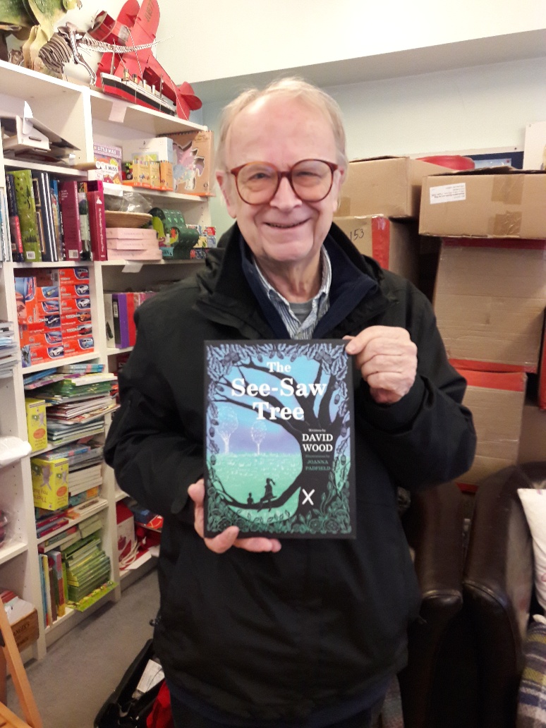 WimbledonBooks's tweet photo. Thanks David Wood for popping in and Signing your gorgeous picture book The See-Saw Tree. Why we should protect and not fell our ancient trees for redevelopment, as they support not only animals, birds and insects but enrich the lives of local communities. @SeeSawTreeBook https://t.co/M73YhsC7jl