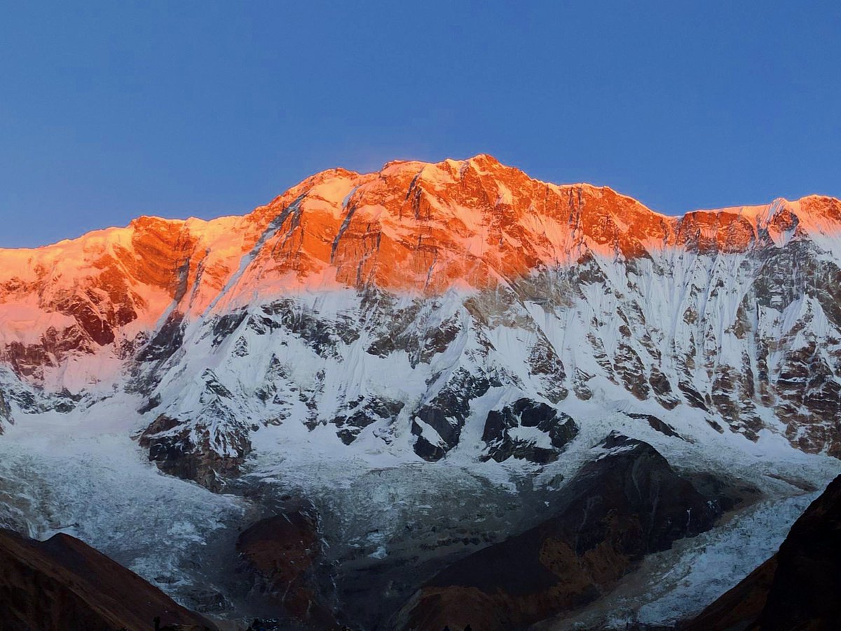 Travelmaxguide's tweet photo. Sunrise reflection on Annapurna I 8091m, tenth highest mountain in the world. Explore Annapurna range with local tour operator. Go Local. https://t.co/vwYEP8xWhc