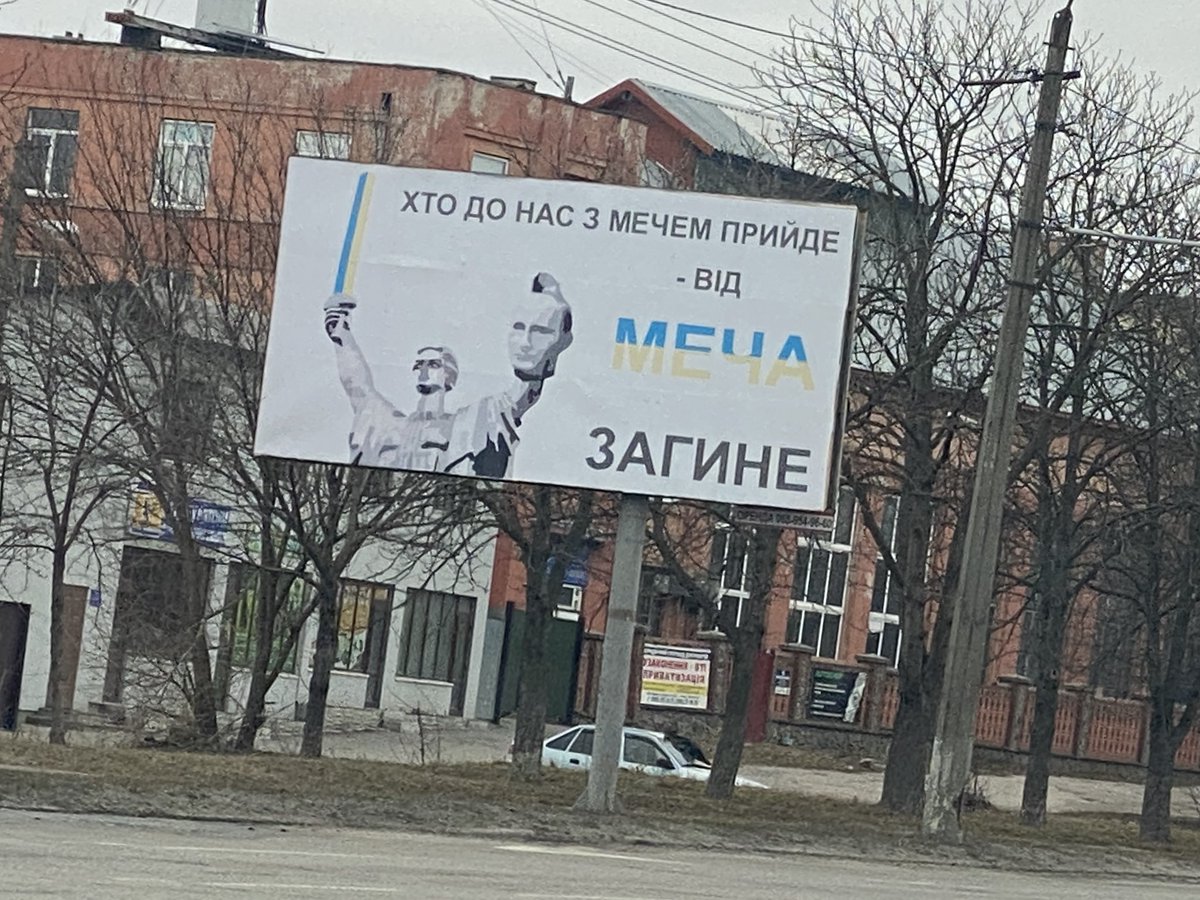 ChristopherJM's tweet image. A few Ukrainian billboards south of Kyiv today: 

“Welcome to hell, you Russian motherfuckers.”

“Russian occupant, want to live? Give me your best Ukrainian trident.” 

“Those who come at us with a sword will die by a sword.”