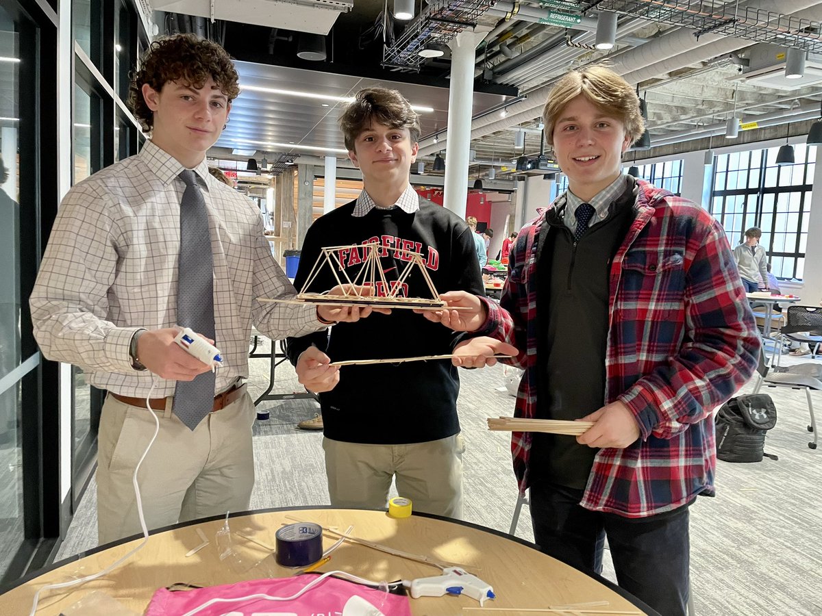fairfieldprep's tweet image. A fun day of challenge for Honors Physics classes! Students worked with partners to build bridges that could sustain 50 lbs using scientific principles. Lots of duct tape, glue and sticks utilized! 
#BeIgnited #PrepSTEM #BeChallenged #WorldEngineeringDay #McLeodInnovationCenter