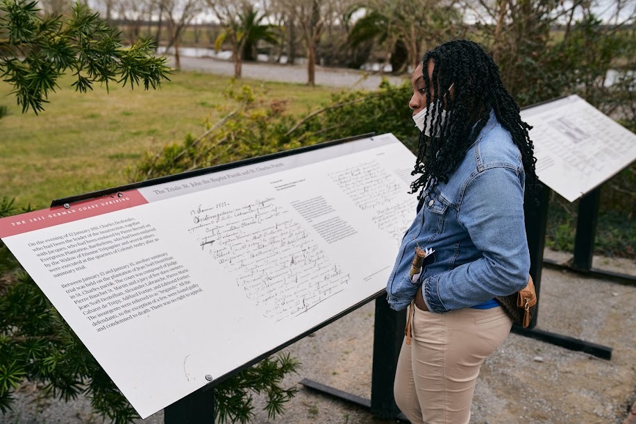 A Belaire student reads information about the 1811 Slave Revolt of St. John the Baptist Parish, quite possibly the largest in US history. Visit whitneyplantation.org to book your tour today.