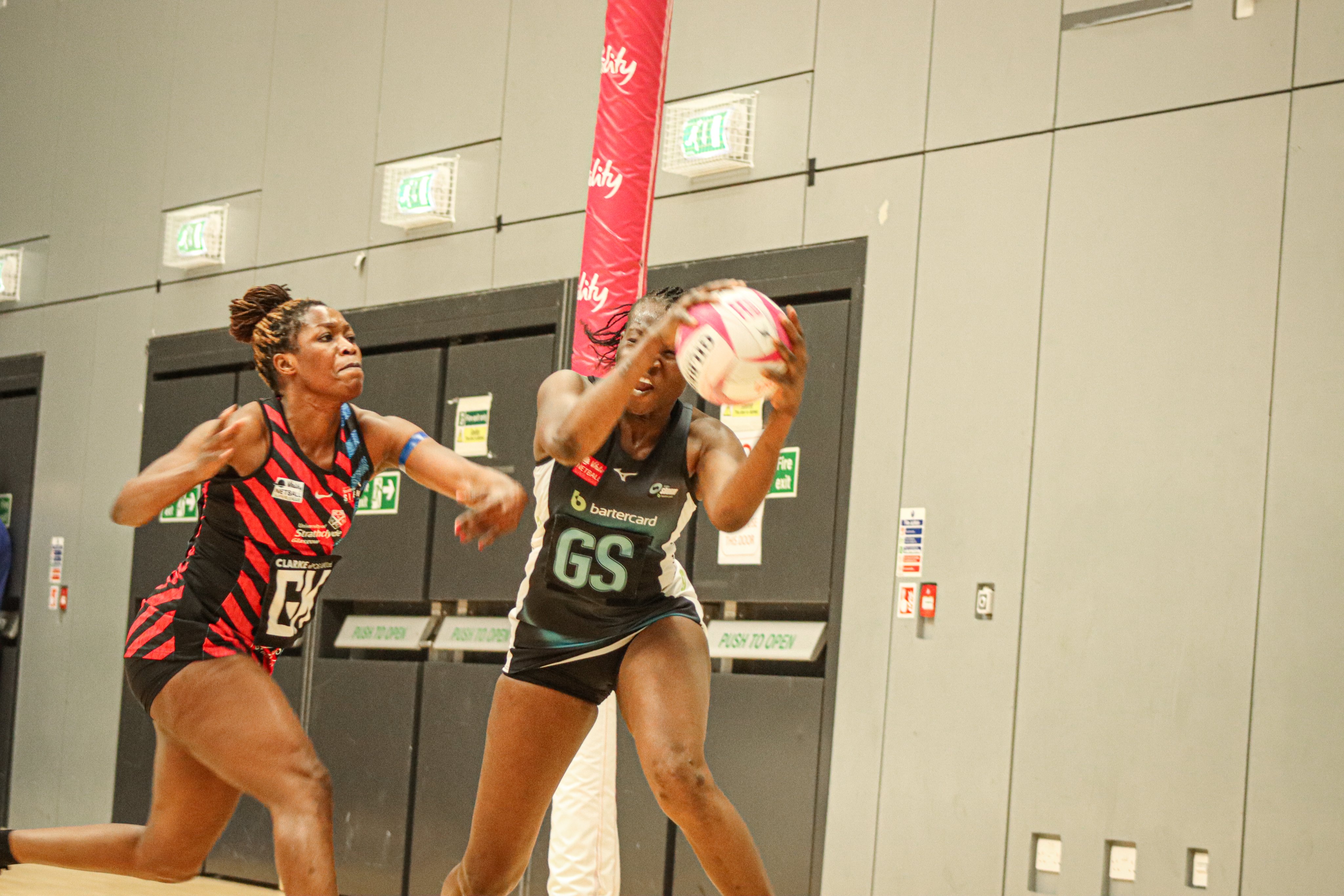 Proscovia Peace takes a ball under immense pressure from Towera Vinkhumbo (Image: @SurreyStorm)
