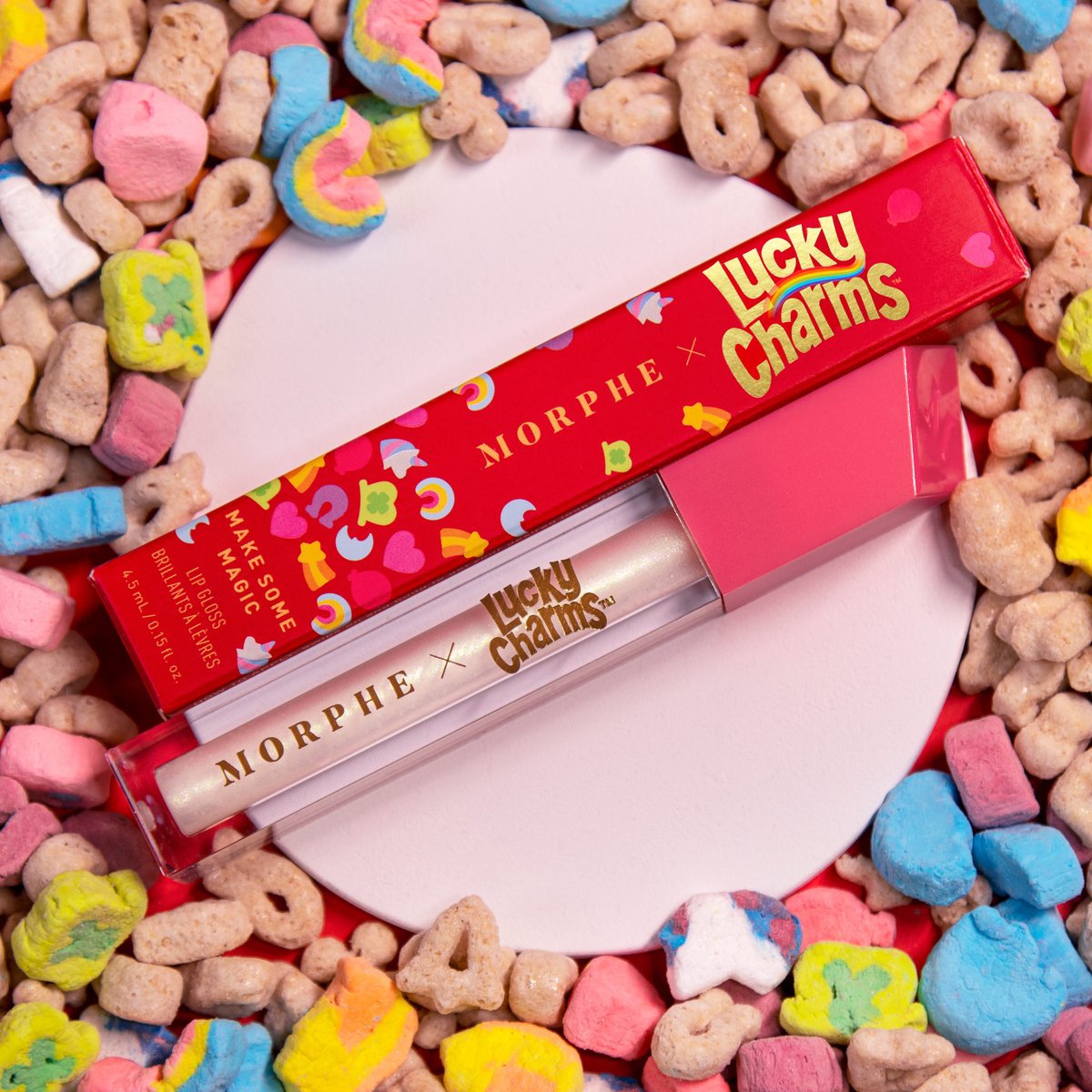 MorpheBrushes's tweet photo. Dazzle your senses with the NEW Morphe x Lucky Charms MAKE SOME MAGIC LIP GLOSS ($10 usd) ✨🍀🌈 Swipe on shade “Marshmallow Charm” for a delightfully sweet scent and pearlescent shimmer. https://t.co/FvLntJLz9Q