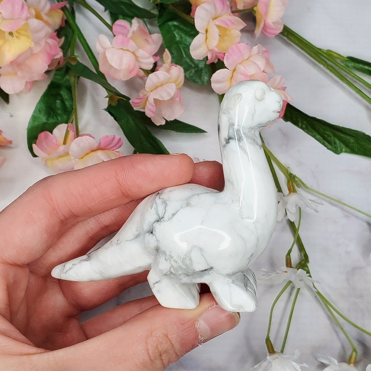 kimskrystalshop's tweet photo. DINO GIVEAWAY 🦕 

one person will win this lovely howlite dinosaur carving 🤍 

how to enter:
RT this post &amp; follow me
tag at least one friend below 

ends 3/12 

thank you guys so much for all of the love and support I appreciate everything 🥺 https://t.co/P7tz7YzXug