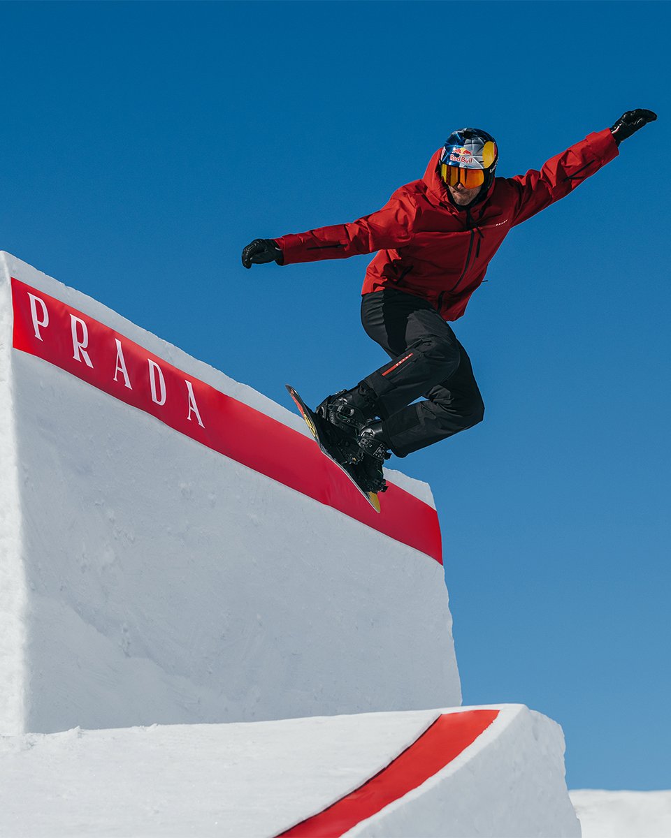 Prada's tweet photo. #PradaLineaRossa meets @redbull and #PierreVaultier who returns to the highest level, following his acrobatics on a hypnotic course. https://t.co/J0xEmBH4fQ