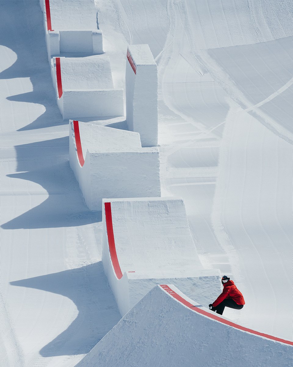 Prada's tweet photo. #PradaLineaRossa meets @redbull and #PierreVaultier who returns to the highest level, following his acrobatics on a hypnotic course. https://t.co/J0xEmBH4fQ