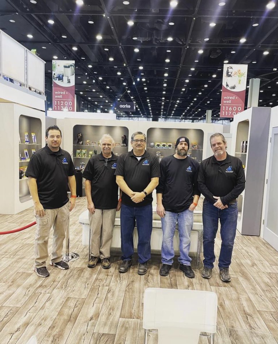 AmicusTradeshow's tweet photo. Meet the team! Project Manager, Jim Andronis (pictured center) and Logistics Manager, Frank Kocimski (pictured right) lead the team this morning as the International Housewares Show in Chicago opens! Brand new booth for a revamped show! We’re glad to be back. #boothbuilds https://t.co/l8Oq0HGAu4