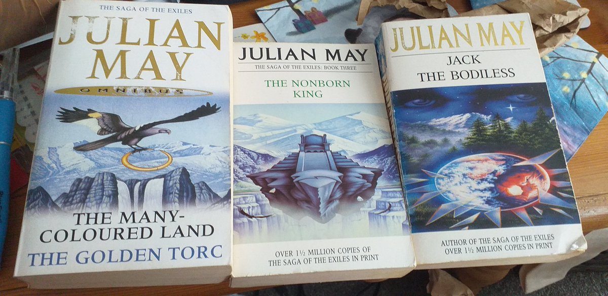Nayuleska's tweet photo. So I bought these books off ebay which arrived today, read them as a teen many many years ago. Loved part of the Exiles series by #JulianMay but this reread i am truly enjoying them more! #scifi #sciencefiction https://t.co/xteSV6BBR7