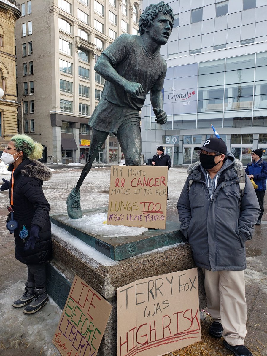 guillaum3roy's tweet photo. Counter protesters put a sign on the Terry Fox statue. They do exactly what the mass media condemned as Disgracefull. https://t.co/9lRPtUKoQC