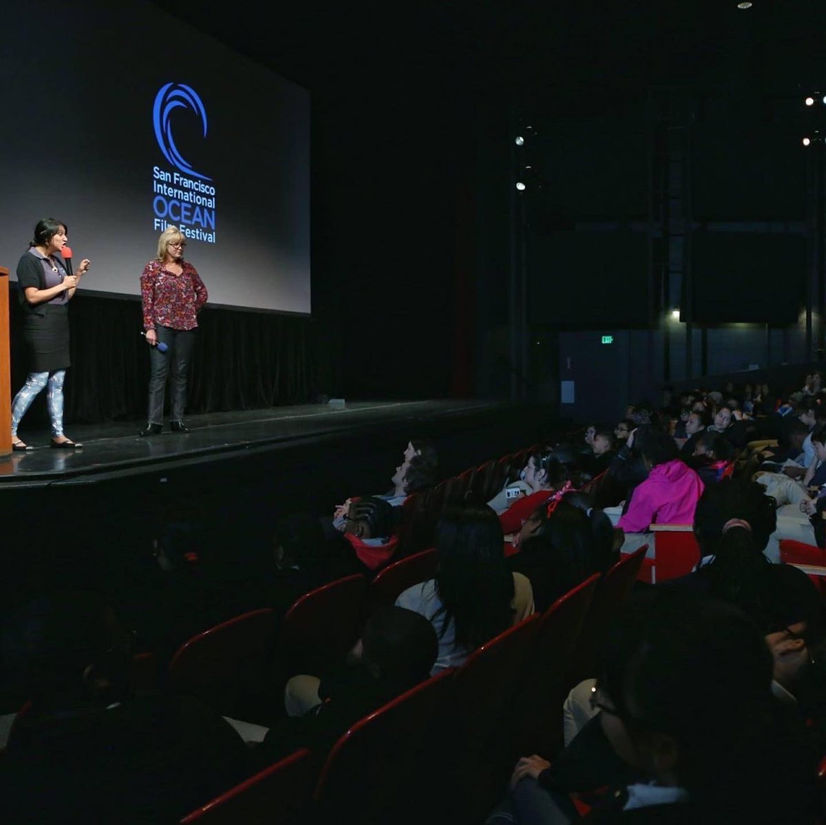VickySharky's tweet photo. It’s official!! The International Ocean Film Festival is back for #IOFF2022 at Fort Mason’s Cowell Theater. April 7th thru 10th. Here’s a #FlashbackFriday to past years and my time as emcee of the Education Programs. https://t.co/rn5YI2Cmkl