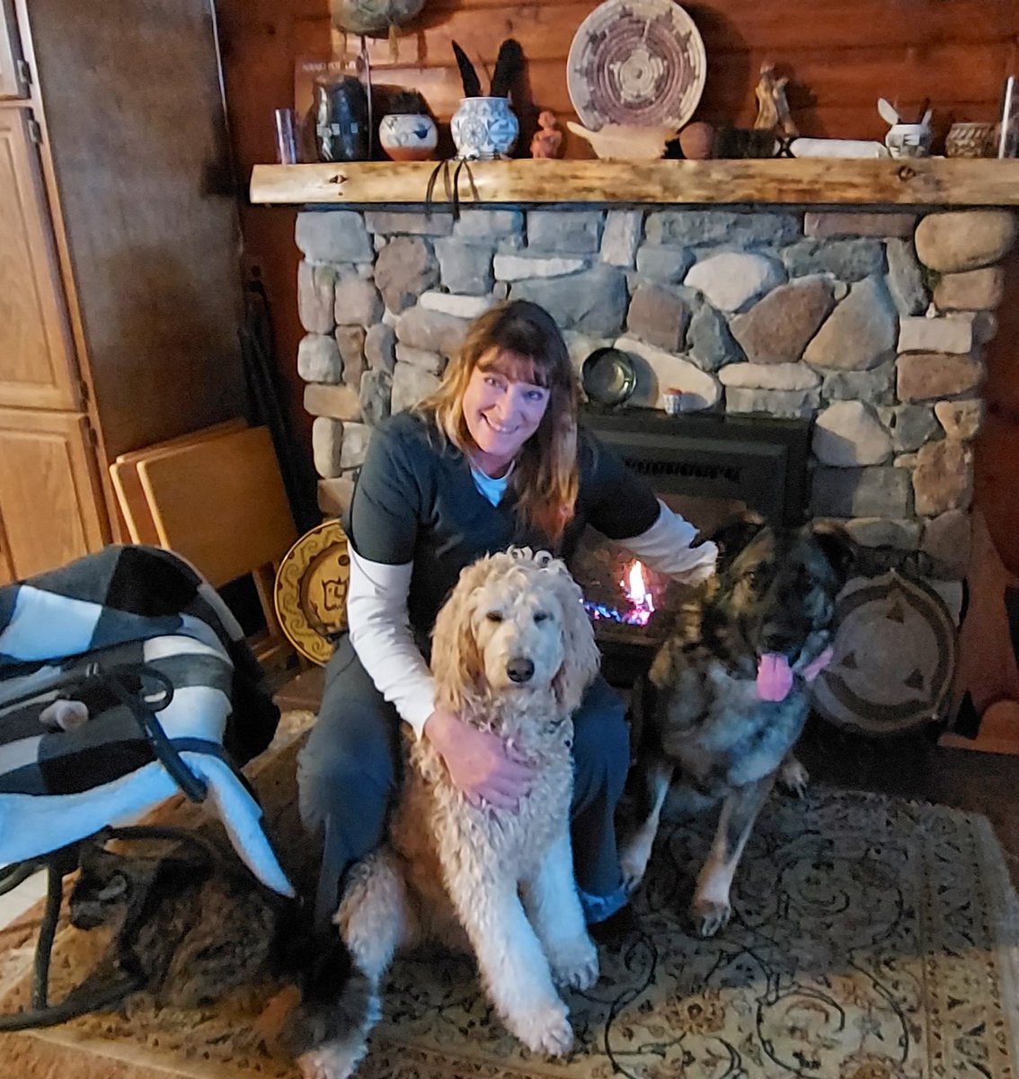 julee_avery's tweet photo. My kids and me in front of my cozy cabin fireplace. https://t.co/LZ1EDsWjGR