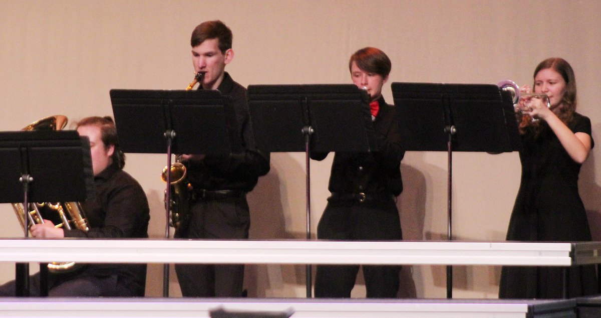 Plattsmouth show choir students used a softball/baseball theme for their performance at today's The Rock Show Choir Competition at Lincoln Northeast. Plattsmouth singers and instrumentalists took part in the event.