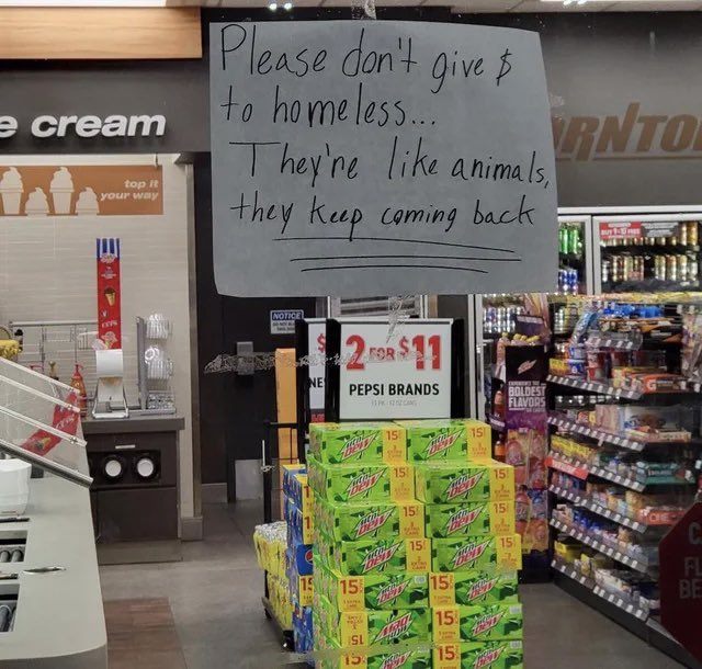 waltermasterson's tweet photo. I can’t read the sign, but I think it says “Put a Brick Through my Window” https://t.co/YmZapwV4Ol