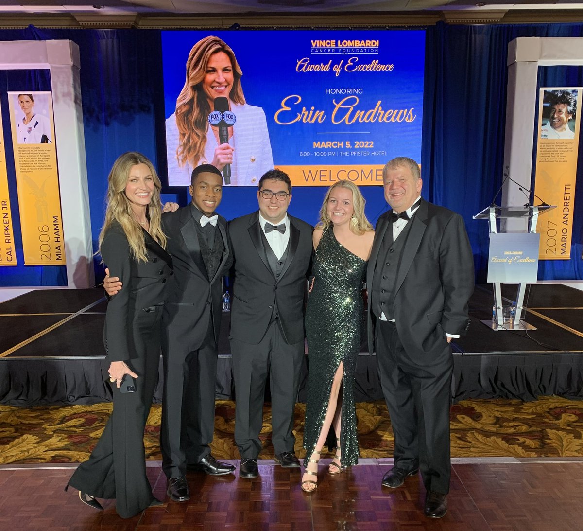 ByJohnLeuzzi's tweet photo. What an amazing and memorable night it was at the @Lombardi_Fdn event tonight with my @MU_Wire family! 

Shoutout @ErinAndrews for taking a photo with us! #BeatCancer https://t.co/O3zRn43kqR