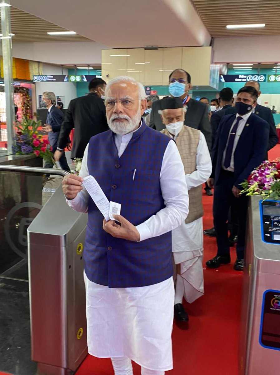 ndtv's tweet photo. Prime Minister Narendra Modi buys a ticket before travelling on #PuneMetro. 

PM Modi today inaugurated Pune Metro Rail Project. https://t.co/juGoROmkZ9