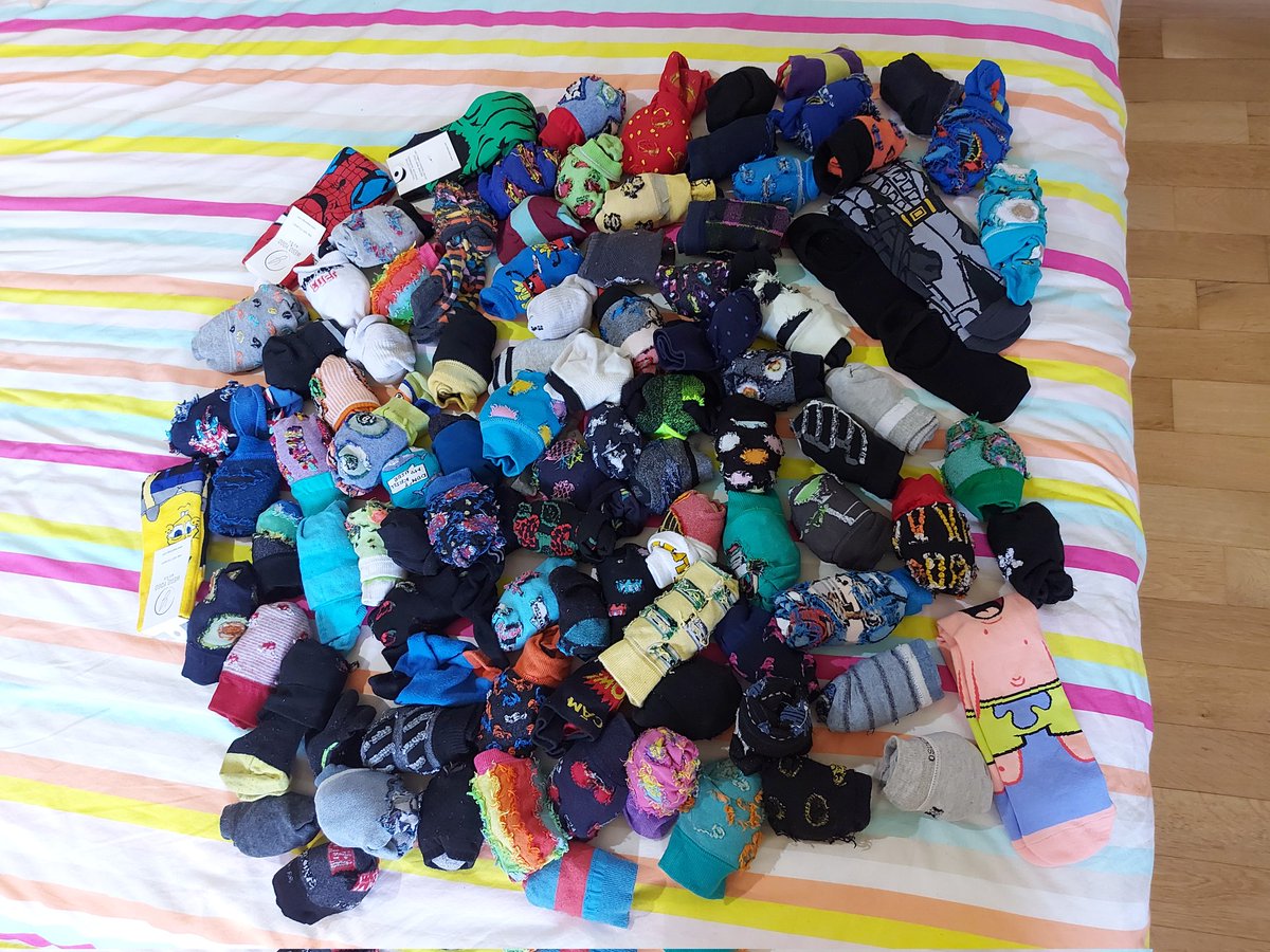 RobinAdamsZA's tweet photo. Only some of the sock collection. But it has shrunk significantly since then. Out with the old, in with the funky new. 🧦 #LifeIsTooShortForBoringSocks https://t.co/51VZw0LGOb
