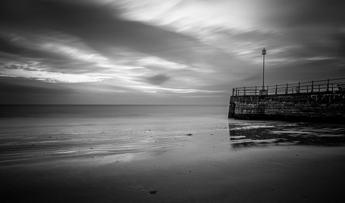 The black and white version, sunrise this morning in Swanage. #blackandwhitephotography #longexposure