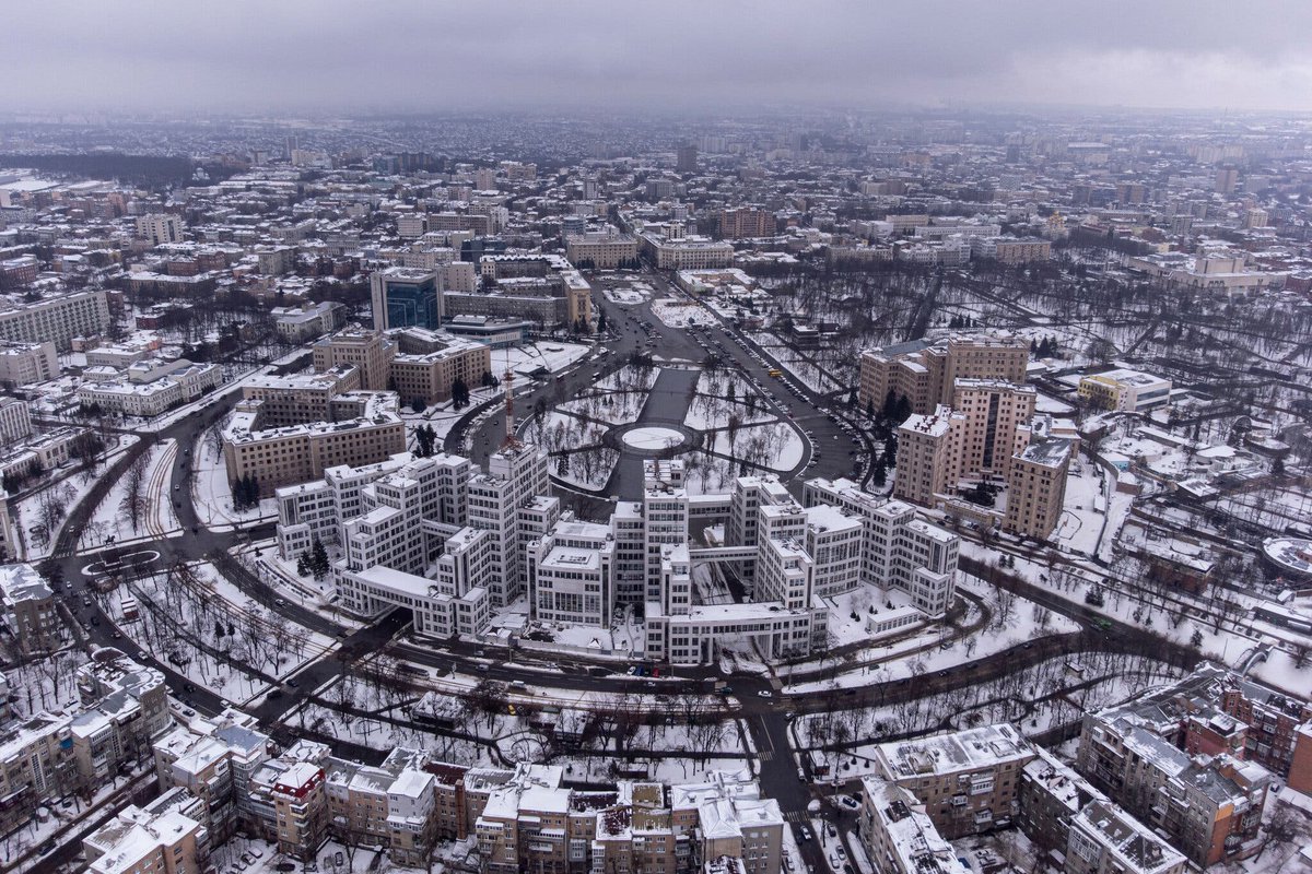 KenRoth's tweet photo. Ukraine: "Russian bombs have devastated the city’s downtown core, including Kharkiv National University." Here is "Kharkiv’s city center in January before the invasion." Photo Credit Evgeniy Maloletka/Associated Press https://t.co/m8dOfwBYmz https://t.co/8GjTLQPmqj