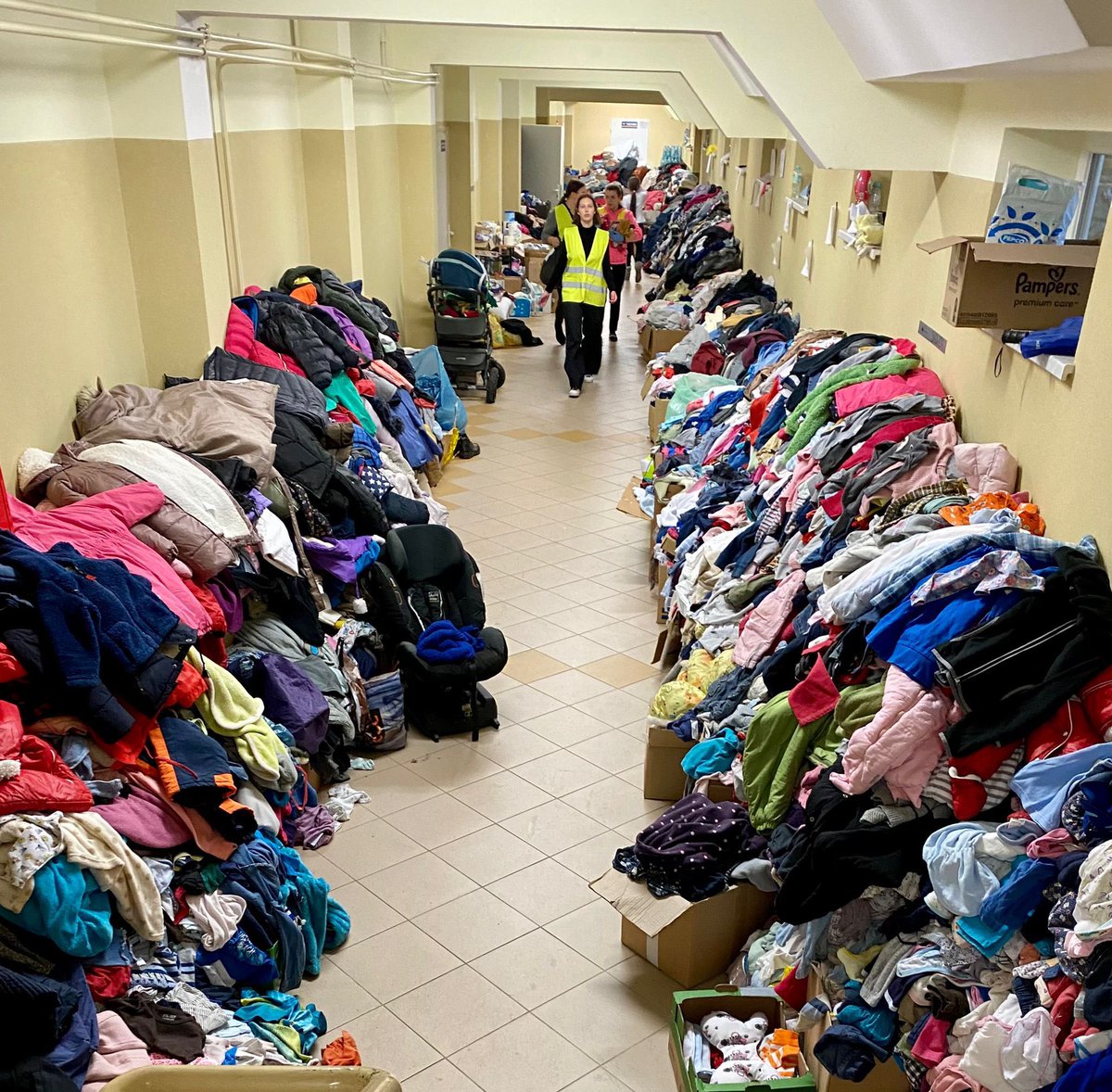 FilippoGrandi's tweet photo. At the Polish/Ukrainian border I was impressed by the outpouring of solidarity by communities through Poland in support of refugees: many volunteers in action, and piles of donations everywhere, all effectively organized by border guards and local authorities. https://t.co/QRW5rwXdV7