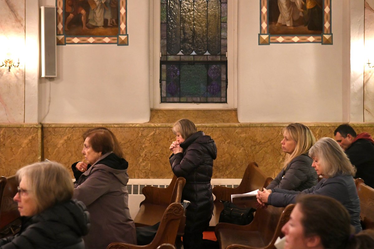 Parishioners at St. Peter &amp; Paul Ukrainian Catholic Church in Auburn pray for Ukraine during an evening service. The church will hold a rally of support for Ukraine on Sunday, March 13 on the steps of city hall at noon. (Kevin Rivoli, The Citizen) Video: auburnpub.com/multimedia/vid…